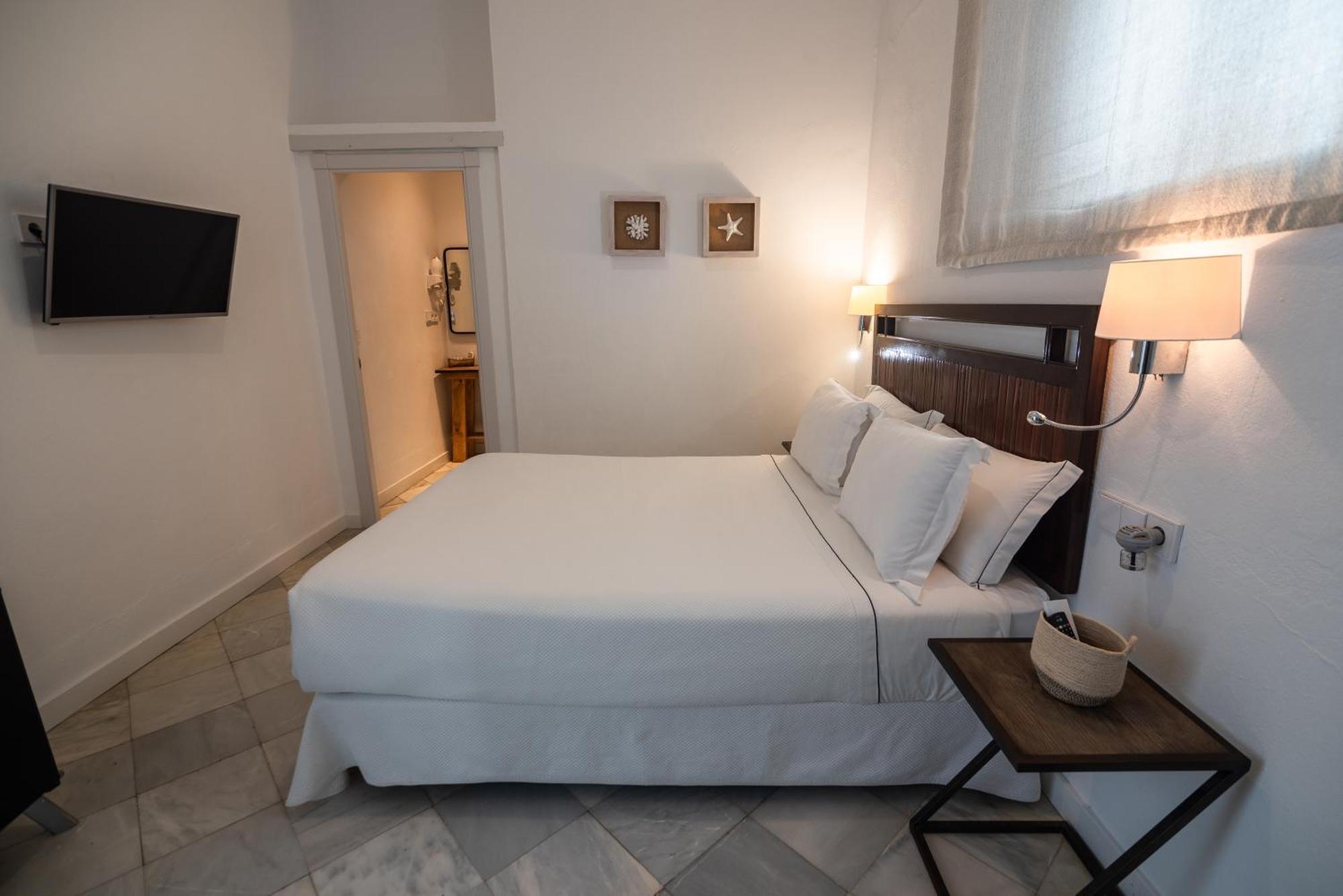 Apartahotel Siglo XIX Tarifa Bagian luar foto