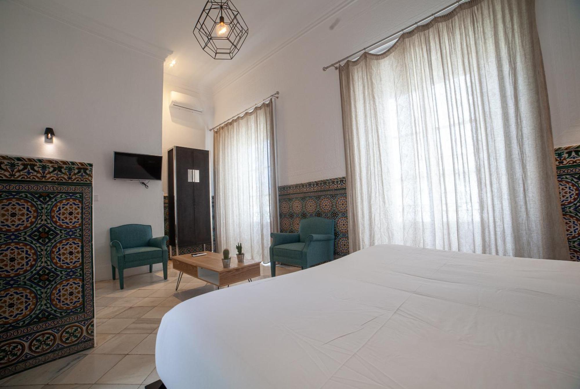 Apartahotel Siglo XIX Tarifa Bagian luar foto