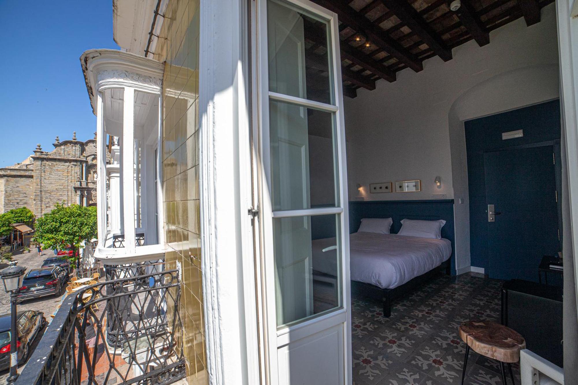 Apartahotel Siglo XIX Tarifa Bagian luar foto