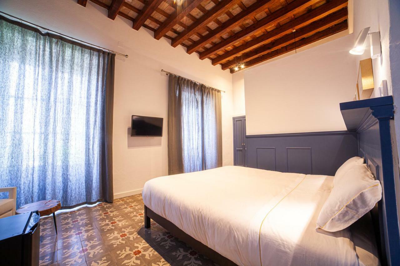 Apartahotel Siglo XIX Tarifa Bagian luar foto